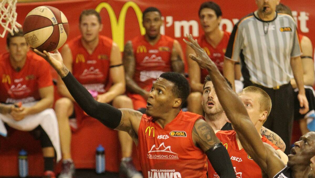 Jahii Carson drives to the basket for the Wollongong Hawks against Melbourne on Friday night. Picture: GREG TOTMAN