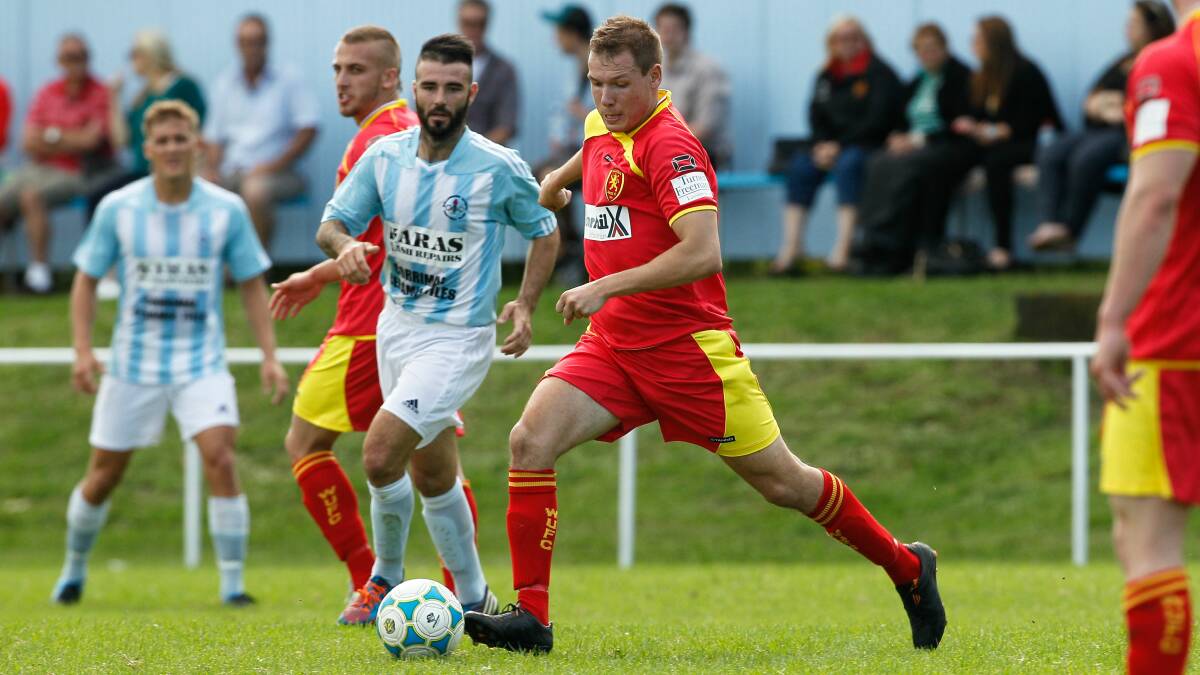 Wollongong United's Billy Tsovolos in action against Olympic on Saturday. Picture: CHRISTOPHER CHAN