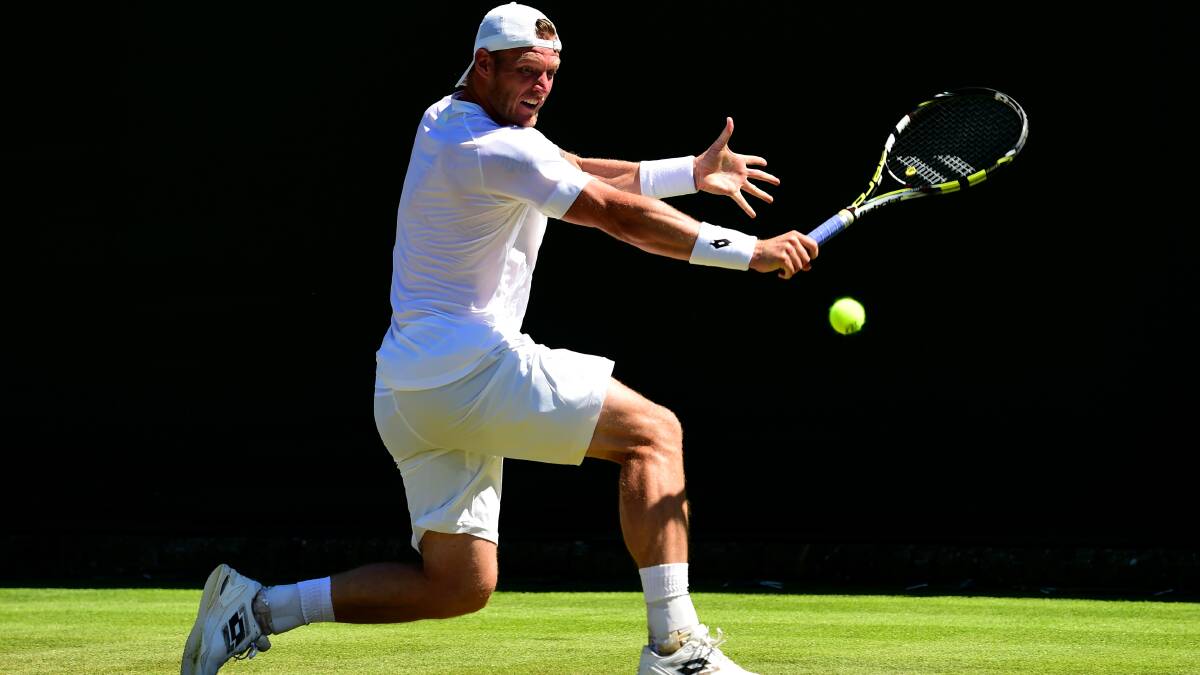 Sam Groth in action during his first round win over American Jack Sock at Wimbledon. Picture: GETTY IMAGES 