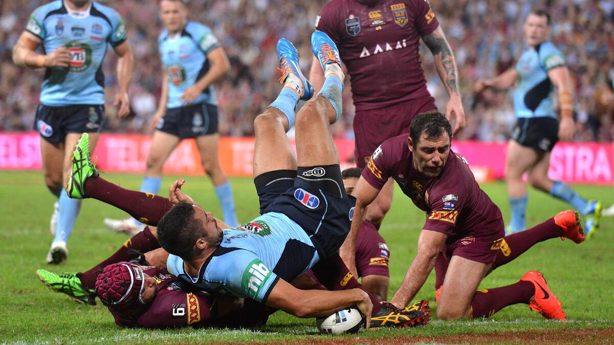 NSW fullback Jarryd Hayne scores during Wednesday night's State of Origin game  at Suncorp Stadium in Brisbane. Picture: GETTY IMAGES
