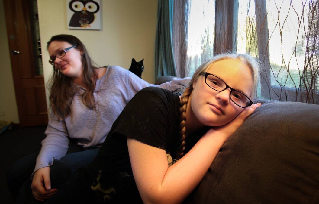 Sophie Mason with her daughter, Faith, who has been the target of attacks by neighbourhood bullies. Picture: ADAM McLEAN