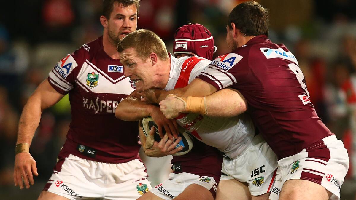 Dragons forward Ben Creagh charges into the Manly defence during Monday night’s match at WIN Jubilee Stadium. Picture: GETTY IMAGES