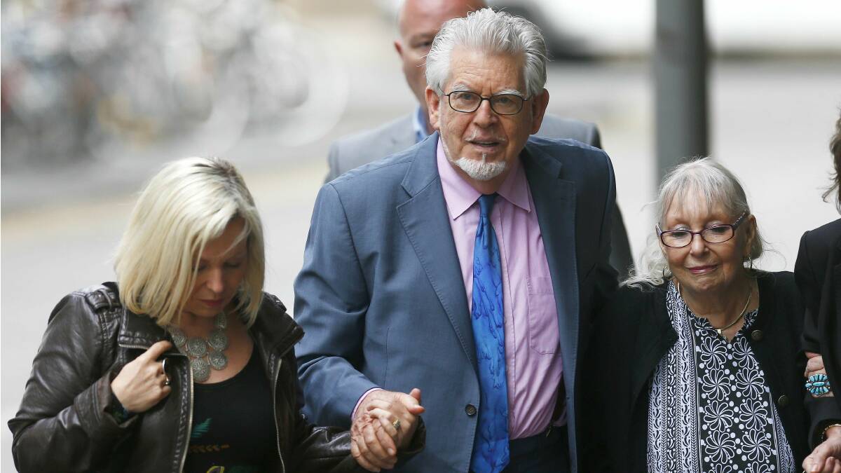 Entertainer Rolf Harris arrives with his daughter Bindi and wife Alwen Hughes at Southwark Crown Court in London May 20. Picture: REUTERS/Andrew Winning 