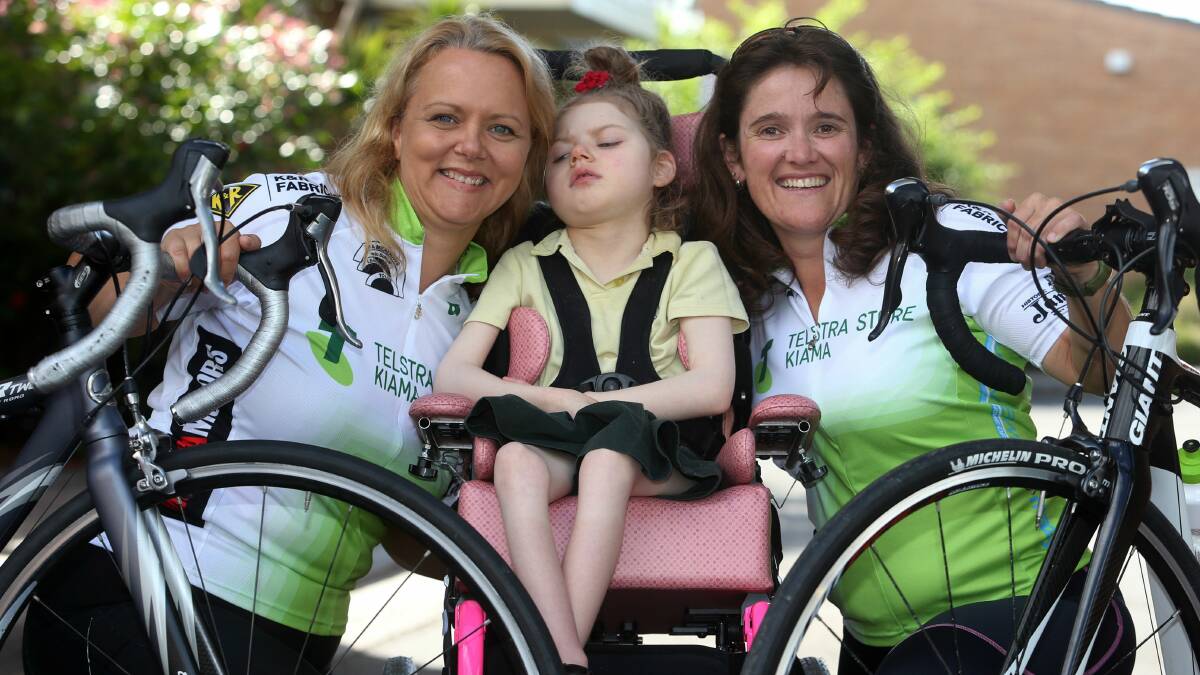 Susan Wallis and friend Shay Macpherson, with Ms Wallis’s daughter, Gracie. Picture: ROBERT PEET