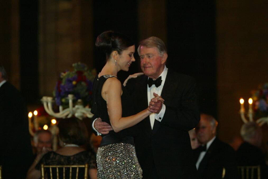 Dancing with Princess Mary of Denmark at the Victor Chang Ball in Sydney.