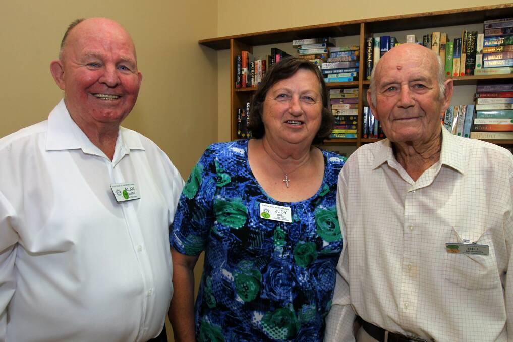 Alan Smith, Judy Bull and Bill Munson at the Rotary Club anniversary.