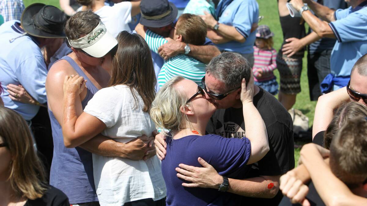 Kiama Autumn Festival-goers locked lips to break the world record for most couples kissing simultaneously for 60-seconds. Picture: GREG TOTMAN
