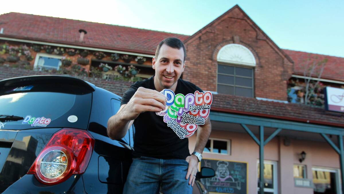 Dapto-born Ryan Cram with his Dapto sticker creation.  