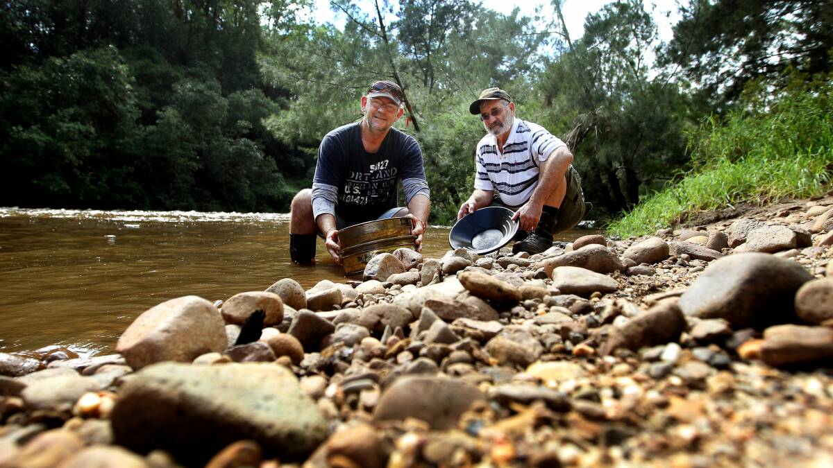 Adam Langland (left) and his uncle Ross at Kangaroo River. Picture: SYLVIA LIBER