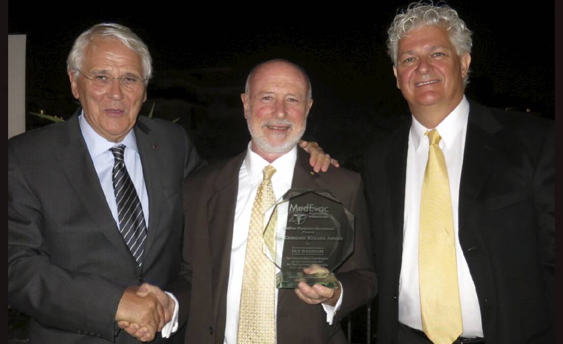 Presenting the  Gerhard  Kugler award (from left), Dr Erwin Stolpe (Germany), Ian Badham and Dr Kevin Hutton (USA). Picture: MARK MENNIE