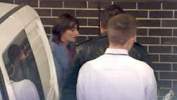 Harriet Wran is led to Liverpool Local Court. Picture: ABC NEWS
