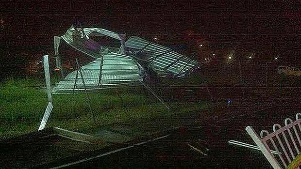 Bargo: Storm blows the back part of the Bargo Pub roof onto the main southern railway. PICTURE: Courtesy of NSW SES