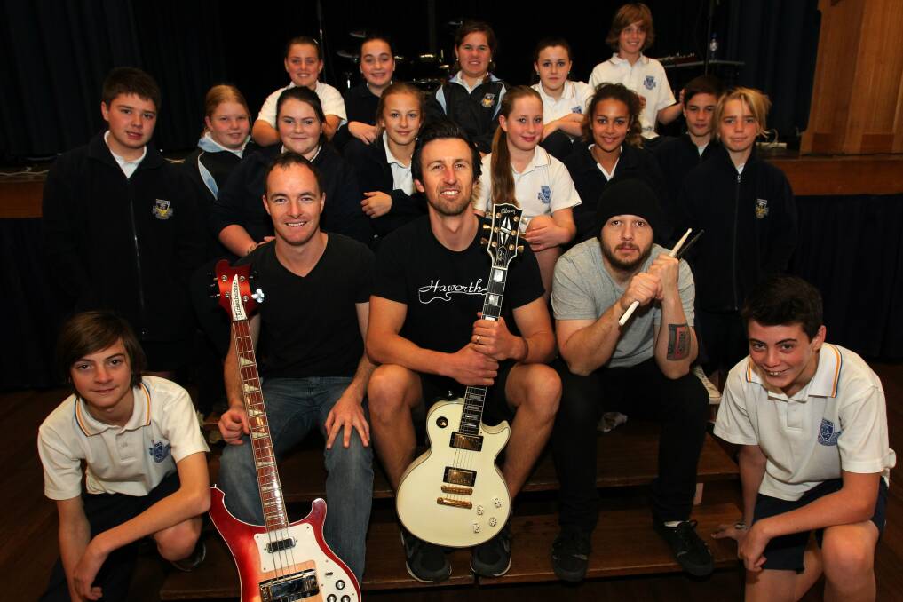 Glenn Haworth and his band are filming performances at schools like Warilla High to raise awareness about bullying and mental health issues. Picture: GREG TOTMAN