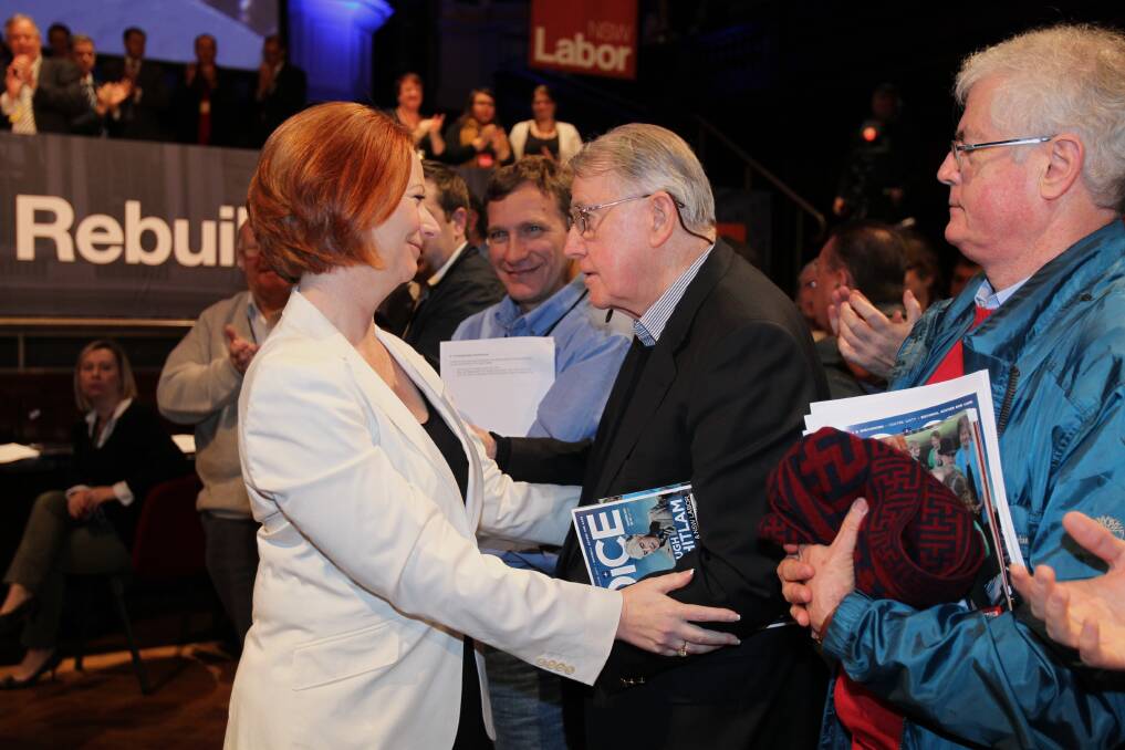Speaking with Prime Minister Julia Gillard at a Labor conference in 2011.