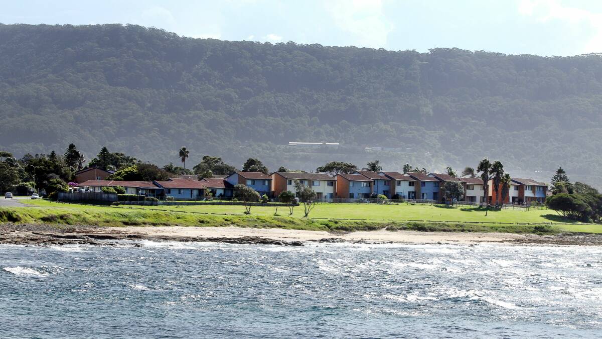 These properties at Bellambi Point are among those that Bede Crasnich wants sold. Picture: SYLVIA LIBER