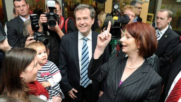 On the up: With then PM Julia Gillard in 2010. Picture: AFP
