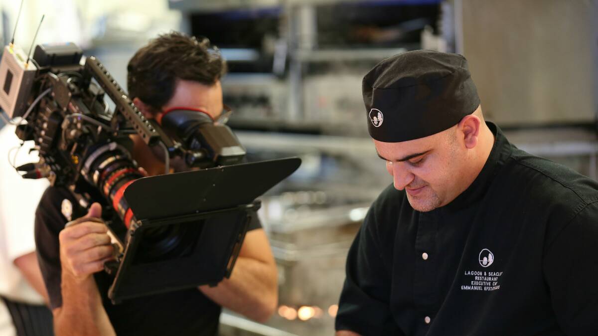 Lagoon Seafood Restaurant chef Emmanuel Efstathiadis is filmed by the LifeStyle Food Channel. Picture: GREG ELLIS