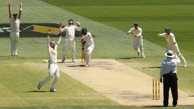 Got him this time: Nathan Lyon picks up the wicket of Cheteshwar Pujara. Picture: GETTY IMAGES