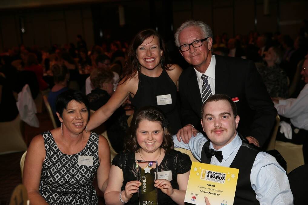 Flagstaff Group’s Karen Burdett and Roy Rogers, back, with Tania Scott, Jasmine Hill and Brad Kirby at the NSW Disability Industry Innovation Awards in Sydney. Picture: GREG ELLIS