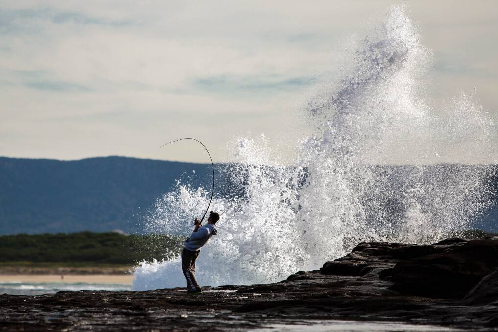 A man fishing near Hill 60, Port Kembla. Picture: CHRISTOPHER CHAN