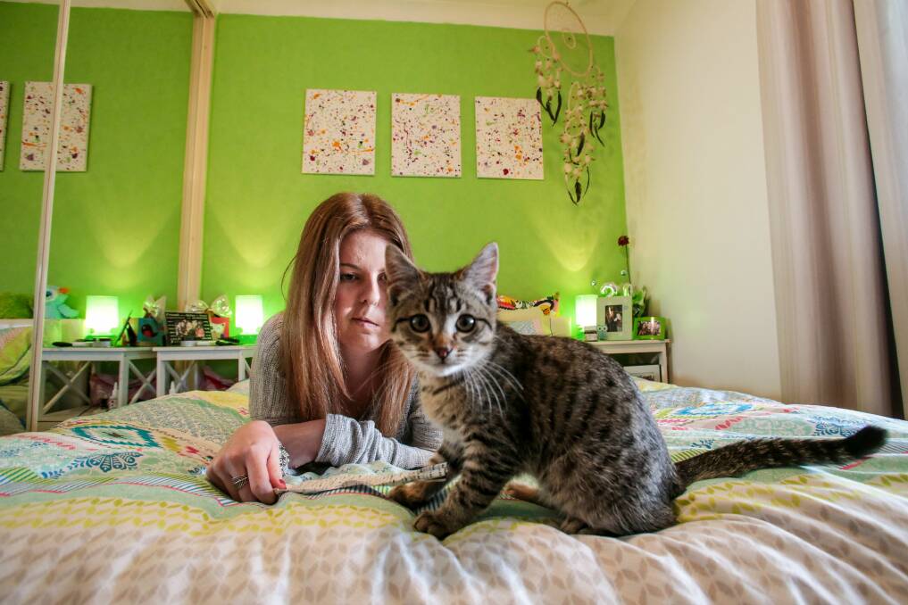 Rochelle Bugden finds her new pet, Tuma, is a comfort while she deals with two brain tumours. Pictures: ADAM McLEAN 
