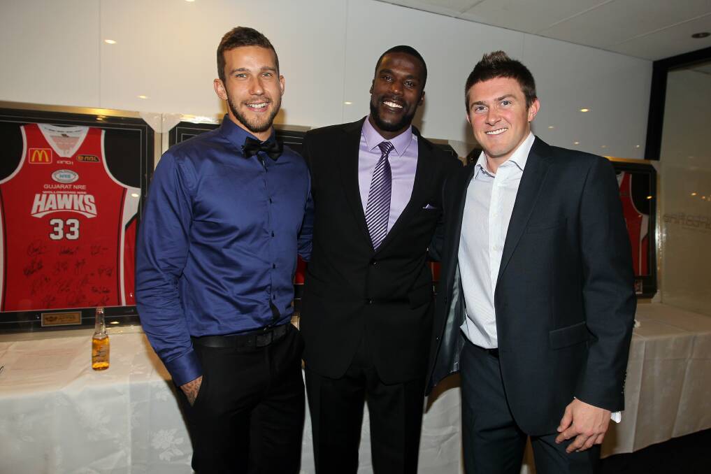Tyson Demos, Kevin Tiggs and Rotnei Clarke at the Wollongong Hawks gala dinner.