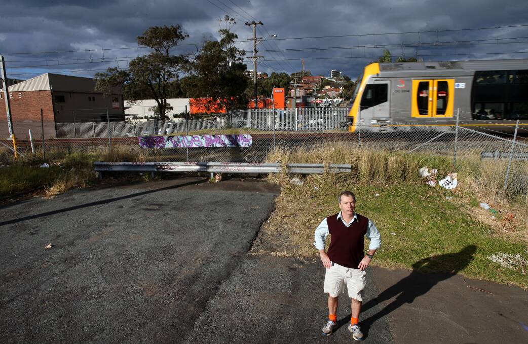Wollongong Councillor Geroge Takacs wants the government to allow pedestrian and cycle access over the rail line using a footbridge. Picture: KIRK GILMOUR