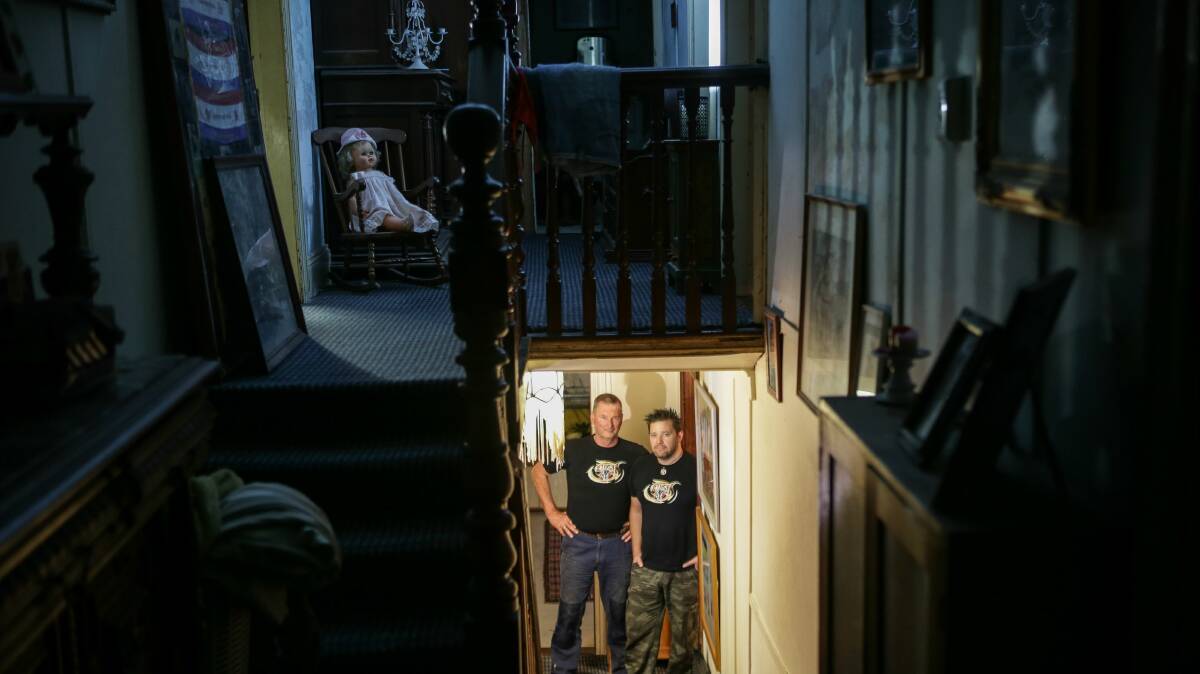 Paranormal investigators Steve Lynch and Dan McMath inside Springfield House, Ulladulla. Picture: CHRISTOPHER CHAN