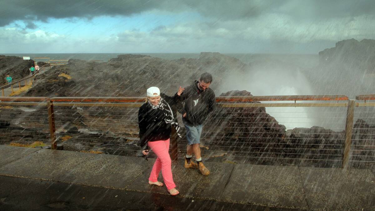 Emma Johnson and Darren Charleston of Geelong at the Kiama Blowhole on Wednesday. Picture: SYLVIA LIBER
