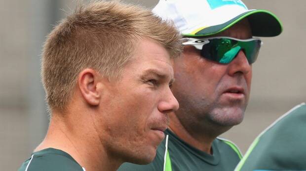 Dave Warner and Australia's coach Darren Lehmann before the Test. Picture: GETTY IMAGES