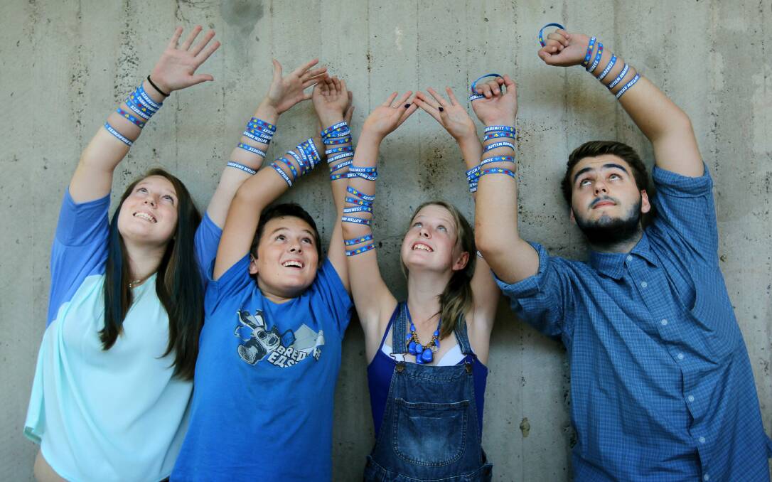 Lake Illawarra High School students Tamara Peters, Kallan Turner, Jade Fitzgerald and Joshua MacLeod dressed up in blue for World Autism Day. Picture: SYLVIA LIBER