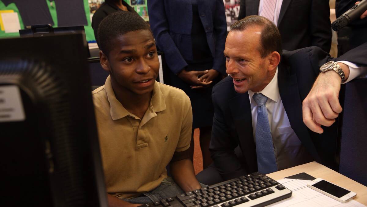 Prime Minister Tony Abbott was impressed by the Pathways in Technology Early College High School during a visit earlier this year. Picture: ANDREW MEARES