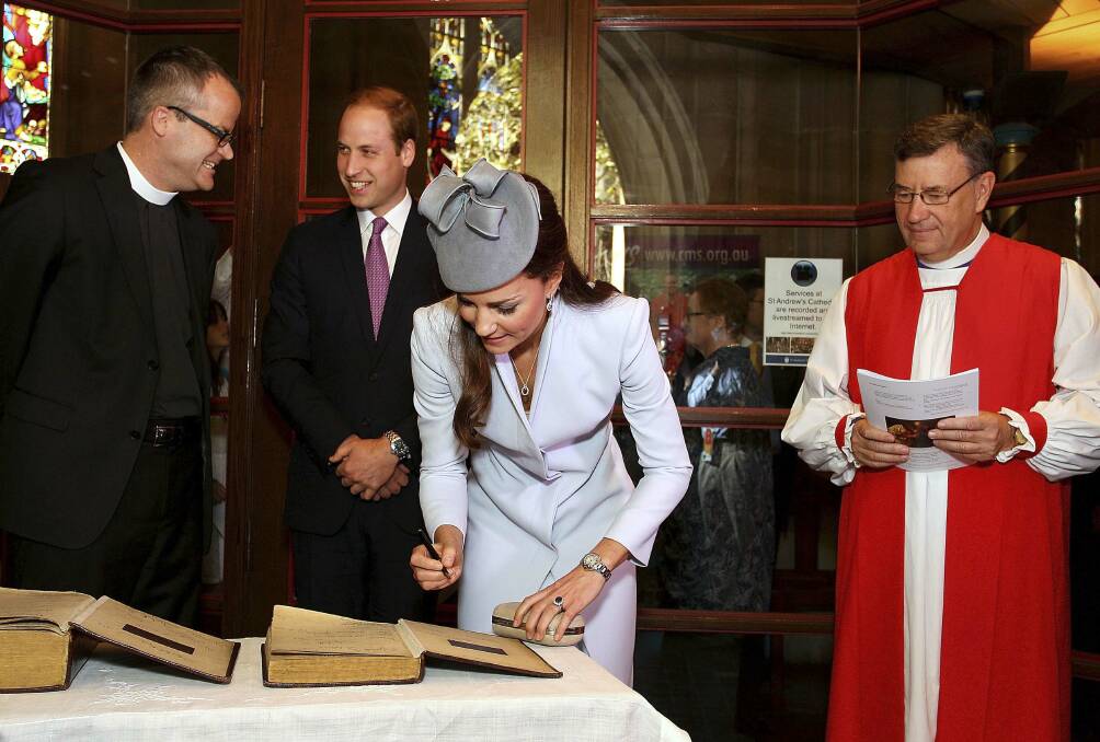 The Duchess of Cambridge signs the First Fleet Bible and Prayer Book. Picture: REUTERS