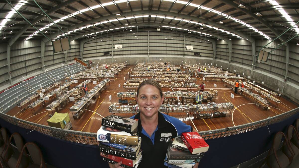 Volume: Claire Leslie from Lifeline  at the Lifeline Book Fair that opens on Friday  at  Berkeley indoor netball courts. Picture: KIRK GILMOUR