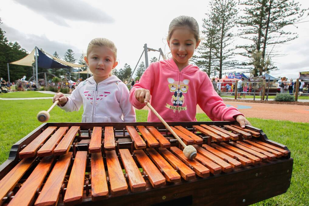 Lilly and Tiara playing music at the Thirroul Seaside and Arts Festival 2014. Picture: CHRISTOPHER CHAN
