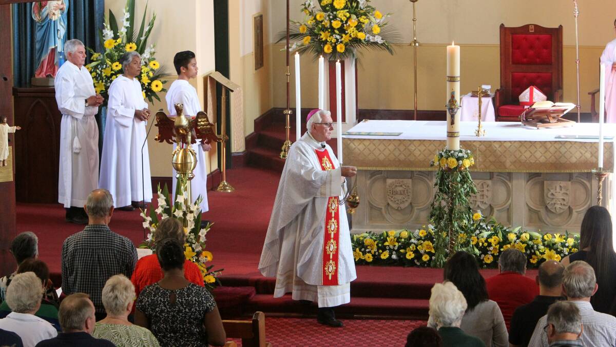 Catholic Bishop Peter Ingham celebrates mass at St Francis Xavier Cathedral on Sunday. Picture: GREG TOTMAN