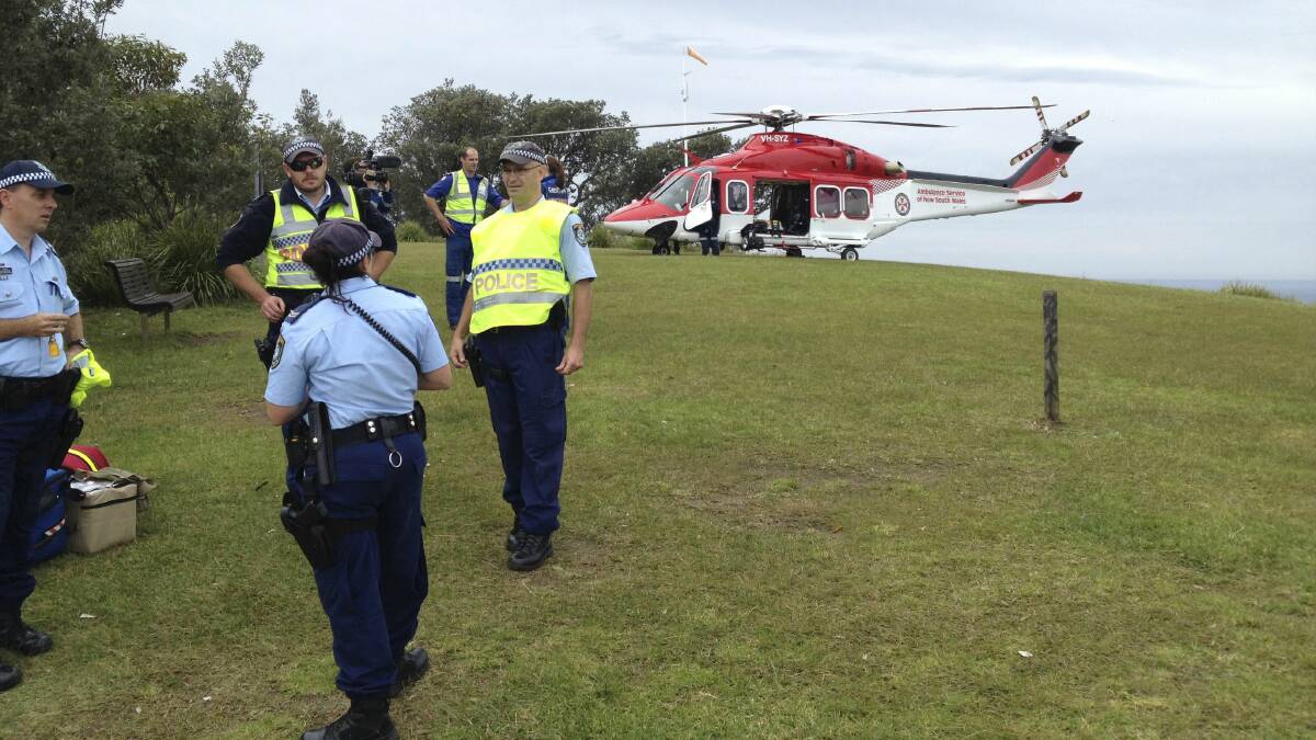Emergency crews near the scene of the accident on Bald Hill. Picture: ADAM McLEAN