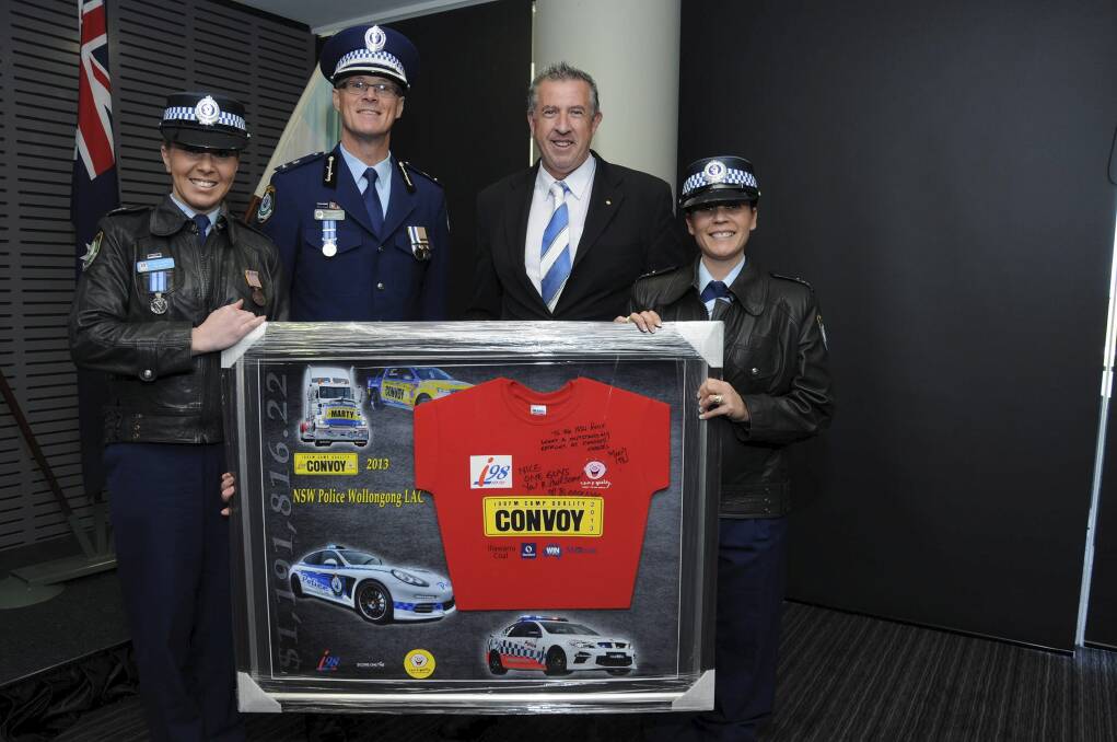 Snr Const Cath Williamson, Wollongong Local Area Commander Superintendent Kyle Stewart, Marty Haynes from i98FM and Snr Const Tania Higgins with the award.