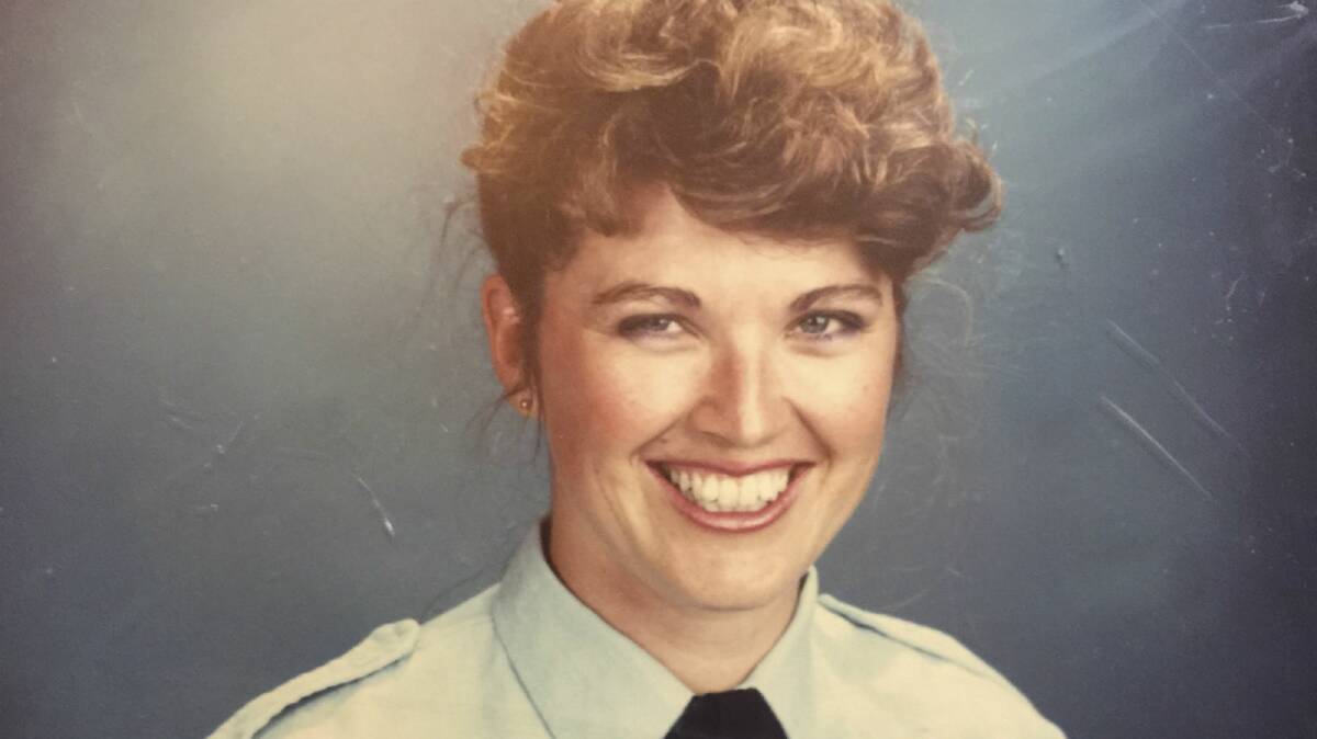 Sandra Mullaly is cheerful in her police photo but her time in the force was anything but.