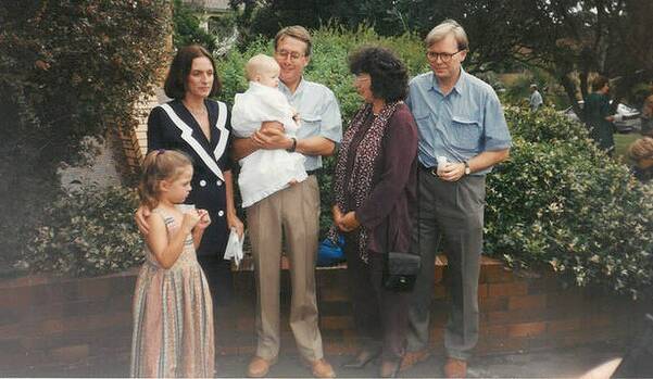 Lives entwined: Swan, his wife Kim and daughter Libbi, with Kevin Rudd and his wife Therese at the baptism of Swan's son Matt in 1995 - Rudd was godfather. Picture: courtesy of Wayne Swan