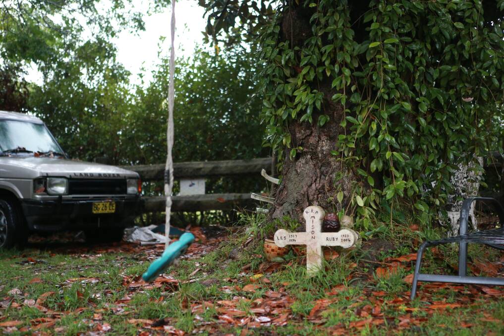  A cross, thought to be a memorial to one of Springfield House’s original inhabitants, sits in the  front yard. Picture: CHRISTOPHER CHAN
