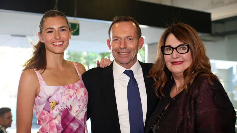 Frances Abbott with her father Tony Abbott and Leanne Whitehouse at an exhibition at the Whitehouse Design Institute.