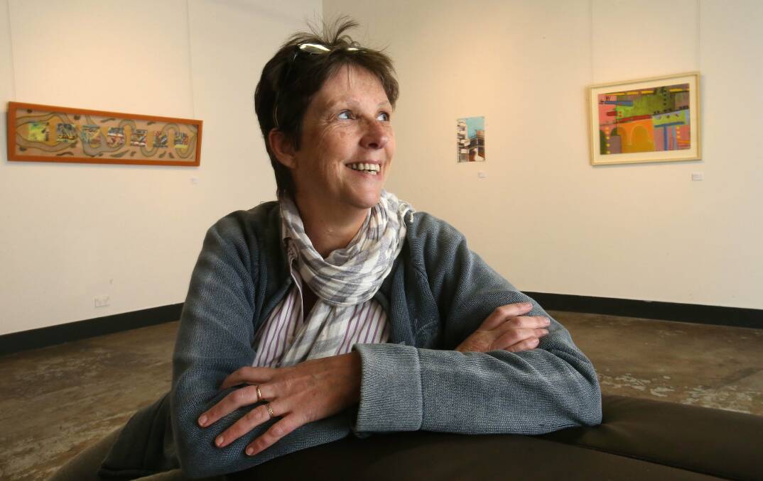 Artist Moira Kirkwood at her exhibition My Illawarra: Urban Landscape at Project Artspace. Picture: KIRK GILMOUR