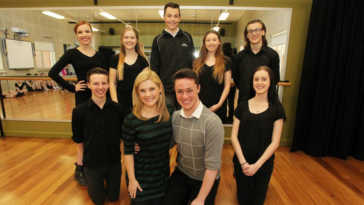 Lucy Durack and Daniel Downing from Wicked meet year 10 musical theatre students from Wollongong High School of the Performing Arts. Back row: Annnalivia Keaveny, Talia Sigswort, Nelson Bowler, Kristie Beedie and Jeremy Boulton; front row: Jack Paterson, Durack, Downing and Zoe Rose. Picture: GREG TOTMAN