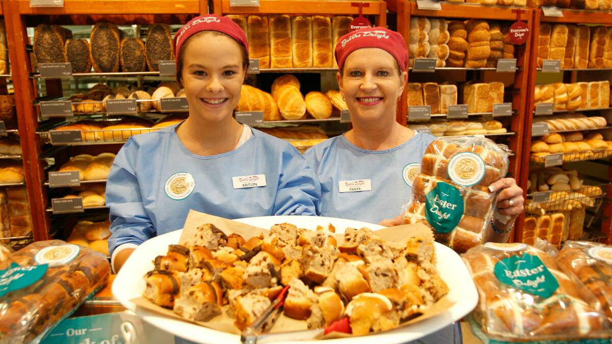 Bakers Delight Figtree employees Kaitlyn Matias and Tanya Kirkland. Picture: CHRISTOPHER CHAN