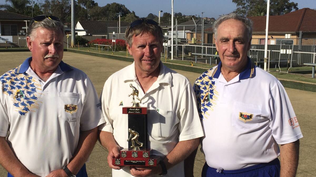 Dapto Bowling Club’s David Mair Day winners Trevor Suckley, Brian Suckley and Alex Fleming with their trophy.