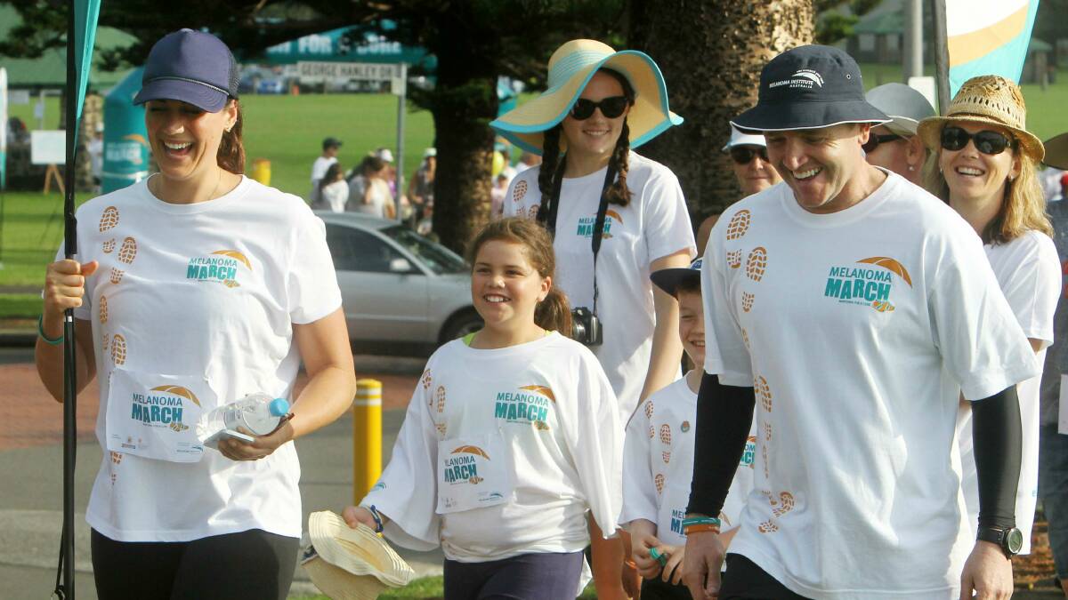 Olympic swimmer Stephanie Rice, with organiser Jay Allen, at the Melanoma March in Stuart Park. Picture: GREG TOTMAN