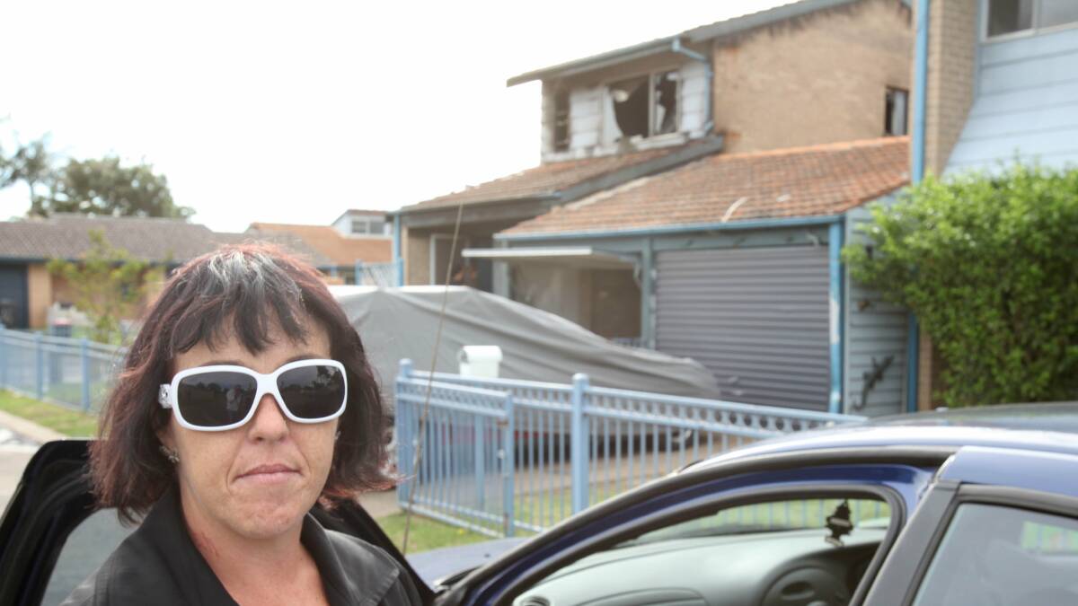 Bellambi resident Nickers Matheson was woken to find the neighbouring townhouse going up in flames.