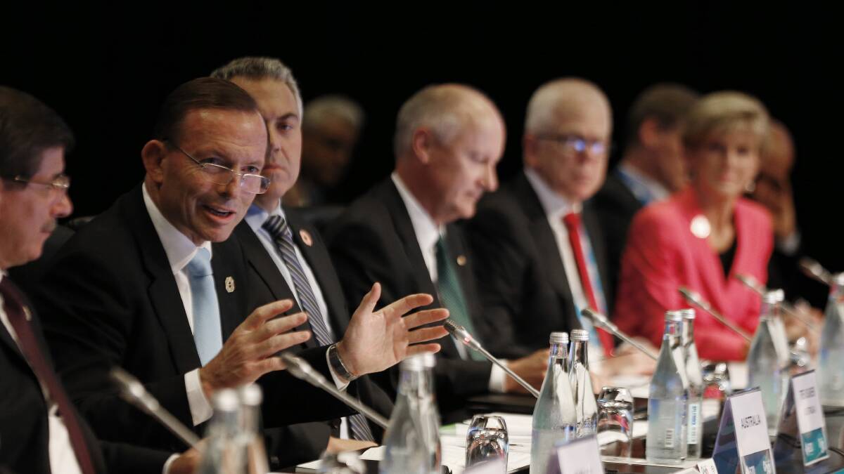 Prime Minister Tony Abbott boasts about domestic achievements in his G20 welcome, before complaining about the difficulties of budget reform. Picture: REUTERS