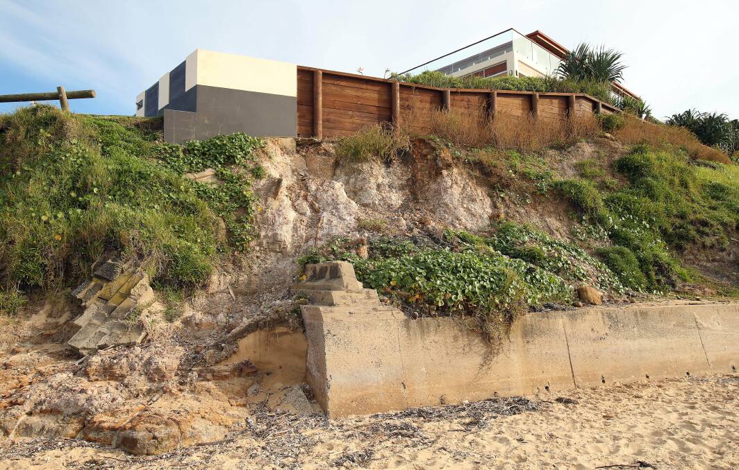 Land drops away near the boundary line of a house on Corbett Avenue above McCauley's Beach at Thirroul. Picture: KIRK GILMOUR